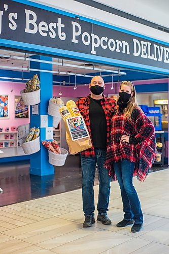 MIKAELA MACKENZIE / WINNIPEG FREE PRESS

Daniel Gard and his wife, Shanna Karle pose for a photo at the new Beaches Sugar Shack location at Garden City Mall in Winnipeg on Monday, Nov. 8, 2021. For Dave Sanderson story.
Winnipeg Free Press 2021.