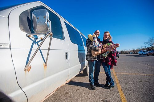 MIKAELA MACKENZIE / WINNIPEG FREE PRESS

Daniel Gard and his wife, Shanna Karle pose for a photo with their original delivery van at Garden City Mall in Winnipeg on Monday, Nov. 8, 2021. For Dave Sanderson story.
Winnipeg Free Press 2021.