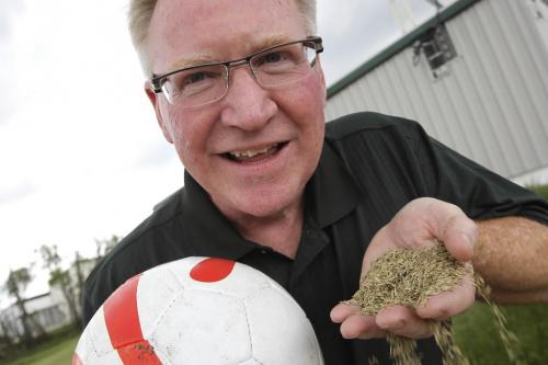 MIKE.DEAL@FREEPRESS.MB.CA 100604 - Friday, June 4th, 2010 Terry Scott with Pickseed holds some of the Manitoba grown perennial rye grass seed that was used to plant the turf at the 2010 FIFA World Cup South Africa which starts next week. MIKE DEAL / WINNIPEG FREE PRESS