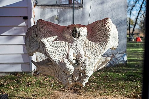 MIKAELA MACKENZIE / WINNIPEG FREE PRESS

A large carved whale skull piece done by a friend of Goota Ashoona and Bob Kussy hangs in their yard near Elie on Tuesday, Nov. 9, 2021. For Jen story.
Winnipeg Free Press 2021.