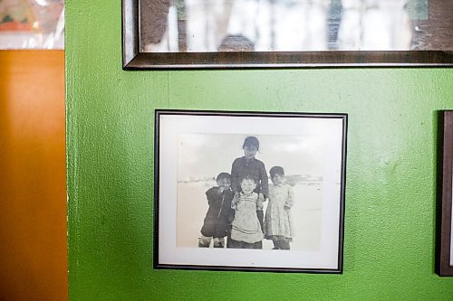 MIKAELA MACKENZIE / WINNIPEG FREE PRESS

An old photo of Goota Ashoona's mom as a child hangs in her home near Elie on Tuesday, Nov. 9, 2021. For Jen story.
Winnipeg Free Press 2021.