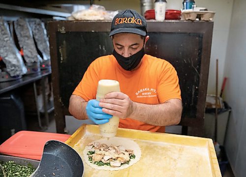 JESSICA LEE / WINNIPEG FREE PRESS

Badis Maymoni makes a pita pie at Baraka Bakery on November 10, 2021.







