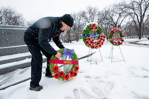 Mike Sudoma / Winnipeg Free Press
Kevin Lamoureux lays a wreathe in front of the Stone of Remembering prior to a Remembrance Day service at Brookside Cemetery Thursday morning. 
November 11, 2021