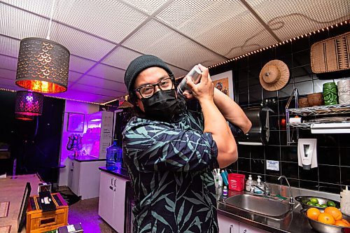 Mike Sudoma / Winnipeg Free Press
Bartender, Nathan Penates, shakes up a cocktail at Baon Manila Nights Wednesday evening
November 10, 2021