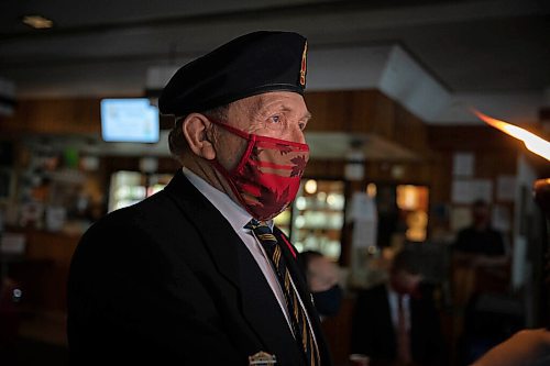 JESSICA LEE / WINNIPEG FREE PRESS

Ron Mazurat holds a torch at Elmwood Legion on November 11, 2021 for Remembrance Day ceremonies.







