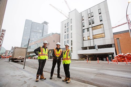MIKE DEAL / WINNIPEG FREE PRESS
School Director, Stéphane Léonard (left), Practice Leader at Architecture49 Inc., Michael Conway (centre) and School Managing Director, Kate Fennell (right) outside the new building at 225 Edmonton Street.
The RWB student boarding building at 225 Edmonton Street that is under construction replacing the accommodations that were torn down to make way for the completion of True North Square and the new Wawanesa head office. 
see Jen Zoratti story
211110 - Wednesday, November 10, 2021.