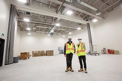 MIKE DEAL / WINNIPEG FREE PRESS
School Director, Stéphane Léonard (left) and School Managing Director, Kate Fennell (right) in the very large training studio and multi-purpose room.
The RWB student boarding building at 225 Edmonton Street that is under construction replacing the accommodations that were torn down to make way for the completion of True North Square and the new Wawanesa head office. 
see Jen Zoratti story
211110 - Wednesday, November 10, 2021.