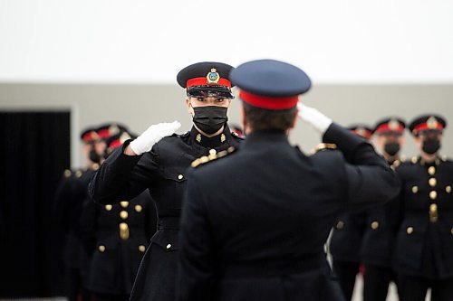 Mike Sudoma / Winnipeg Free Press
Winnipeg police Chief, Danny Smyth, salutes Constable Brandi Chrismas during the WPS Recruit Class 165 graduation event at the RBC Convention Centre Friday afternoon
November 12, 2021