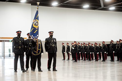 Mike Sudoma / Winnipeg Free Press
The Winnipeg Police Services colours are marched before the graduates of WPS Recruit Class 165 at the BC Convention Centre Friday
November 12, 2021