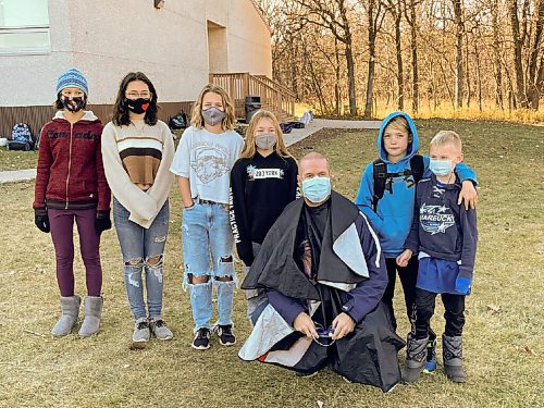 Canstar Community News Nov. 8, 2021 - Students at Starbuck School took part in their 28th Terry Fox Marathon of Hope fundraiser over the fall. With a goal of $10,000, 174 students raised $11,235 earning the incentive to shave their principal's head. Dale Fust, principal of Starbuck School was delighted to take part in the fundraiser. (SUPPLIED PHOTO)
