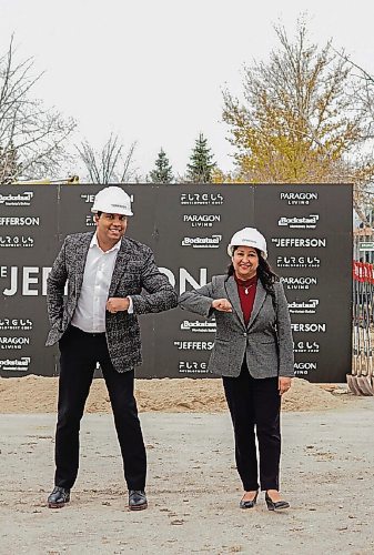 Canstar Community News Nigel Furgus, President of Paragon Design Build, shares an elbow bump with City Councillor Devi Sharma at the official groundbreaking for The Jefferson, a six-storey residential and commercial building going up at 1325 Jefferson Ave.