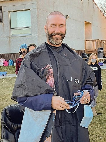 Canstar Community News Nov. 8, 2021 - Starbuck School principal Dale Fust received a haircut from the top fundraising student in this year's Terry Fox Marathon of Hope fundraiser. (SUPPLIED PHOTO)