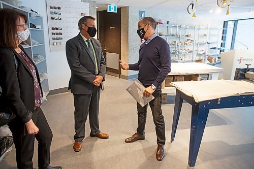 MIKE DEAL / WINNIPEG FREE PRESS
Stephen Borys (right), WAG-Qaumajuq Director and CEO along with Cliff Cullen (left), Minister of Education, celebrates the opening of the new, fully renovated WAG Studio.
211116 - Tuesday, November 16, 2021.