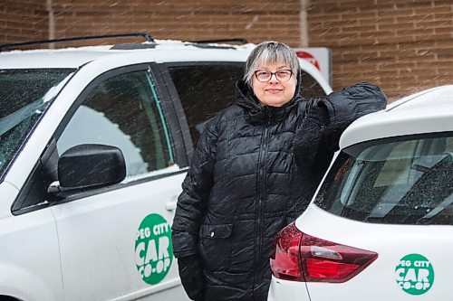 MIKAELA MACKENZIE / WINNIPEG FREE PRESS

Louella Lester, Peg City Car Co-op user, poses for a portrait with one of the cars in Osborne Village on Wednesday, Nov. 17, 2021. For Janine LeGal story.
Winnipeg Free Press 2021.