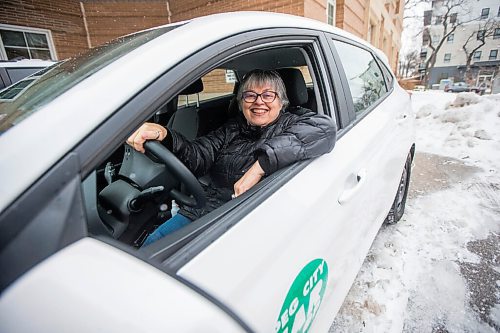 MIKAELA MACKENZIE / WINNIPEG FREE PRESS

Louella Lester, Peg City Car Co-op user, poses for a portrait with one of the cars in Osborne Village on Wednesday, Nov. 17, 2021. For Janine LeGal story.
Winnipeg Free Press 2021.