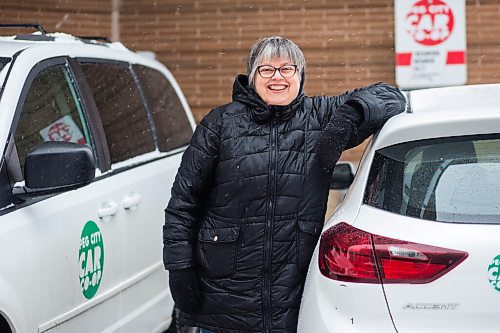 MIKAELA MACKENZIE / WINNIPEG FREE PRESS

Louella Lester, Peg City Car Co-op user, poses for a portrait with one of the cars in Osborne Village on Wednesday, Nov. 17, 2021. For Janine LeGal story.
Winnipeg Free Press 2021.