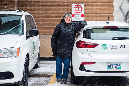 MIKAELA MACKENZIE / WINNIPEG FREE PRESS

Louella Lester, Peg City Car Co-op user, poses for a portrait with one of the cars in Osborne Village on Wednesday, Nov. 17, 2021. For Janine LeGal story.
Winnipeg Free Press 2021.