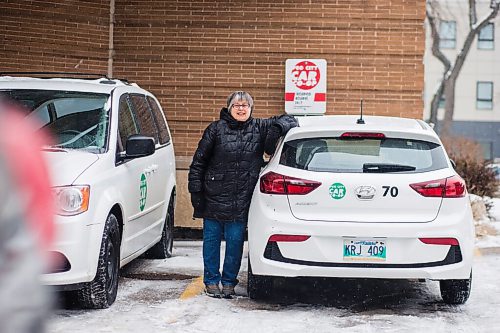 MIKAELA MACKENZIE / WINNIPEG FREE PRESS

Louella Lester, Peg City Car Co-op user, poses for a portrait with one of the cars in Osborne Village on Wednesday, Nov. 17, 2021. For Janine LeGal story.
Winnipeg Free Press 2021.