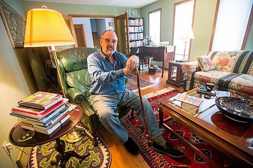 MIKAELA MACKENZIE / WINNIPEG FREE PRESS

Max Johnson poses for a portrait in his home after coming back from Lithuania, where he went to get knee surgery, in Winnipeg on Wednesday, Nov. 17, 2021. For Kevin story.
Winnipeg Free Press 2021.