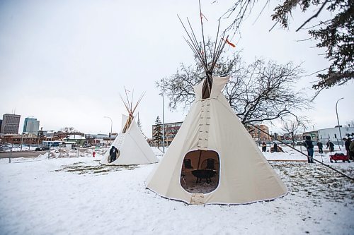 MIKAELA MACKENZIE / WINNIPEG FREE PRESS

Teepees are set up at a media event at 190 Disraeli Freeway about new warming spaces in Winnipeg on Friday, Nov. 19, 2021. For Katie May story.
Winnipeg Free Press 2021.