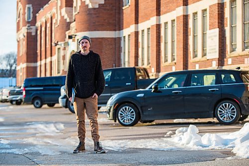 MIKAELA MACKENZIE / WINNIPEG FREE PRESS

Free Press reporter Ryan Thorpe poses for a portrait in front of the Minto Armoury, where Patrik Mathews was at one point stationed, in Winnipeg on Friday, Nov. 19, 2021. For Ryan Thorpe story.
Winnipeg Free Press 2021.