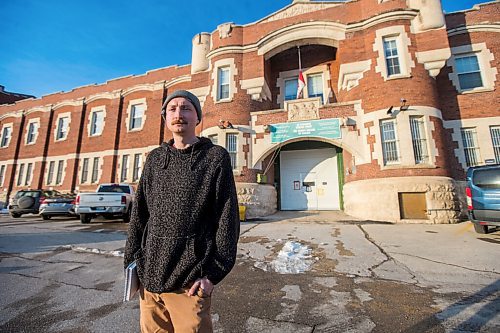 MIKAELA MACKENZIE / WINNIPEG FREE PRESS

Free Press reporter Ryan Thorpe poses for a portrait in front of the Minto Armoury, where Patrik Mathews was at one point stationed, in Winnipeg on Friday, Nov. 19, 2021. For Ryan Thorpe story.
Winnipeg Free Press 2021.