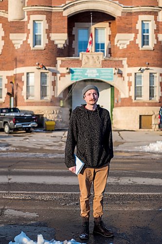 MIKAELA MACKENZIE / WINNIPEG FREE PRESS

Free Press reporter Ryan Thorpe poses for a portrait in front of the Minto Armoury, where Patrik Mathews was at one point stationed, in Winnipeg on Friday, Nov. 19, 2021. For Ryan Thorpe story.
Winnipeg Free Press 2021.