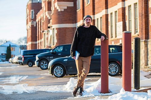 MIKAELA MACKENZIE / WINNIPEG FREE PRESS

Free Press reporter Ryan Thorpe poses for a portrait in front of the Minto Armoury, where Patrik Mathews was at one point stationed, in Winnipeg on Friday, Nov. 19, 2021. For Ryan Thorpe story.
Winnipeg Free Press 2021.