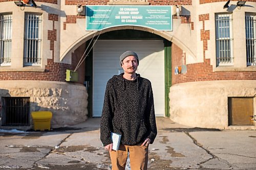 MIKAELA MACKENZIE / WINNIPEG FREE PRESS

Free Press reporter Ryan Thorpe poses for a portrait in front of the Minto Armoury, where Patrik Mathews was at one point stationed, in Winnipeg on Friday, Nov. 19, 2021. For Ryan Thorpe story.
Winnipeg Free Press 2021.