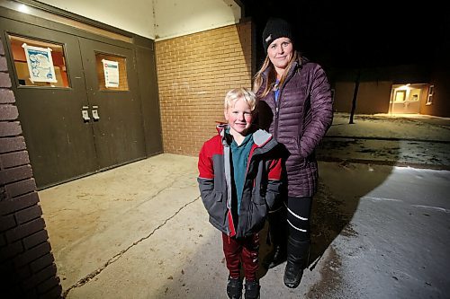 JOHN WOODS / WINNIPEG FREE PRESS
Krystyn Zaretski and her son Archer, who is in grade 1 of Ste Anne School, are photographed outside the school in Ste Anne Sunday, November 21, 2021. Zaretski and other parents are welcoming the return of in-person parent-teacher conferences.

Re: Macintosh