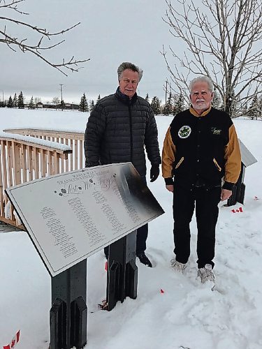 Canstar Community News Lawrence Toet and Peter Martin have spearheaded a project to install plaques honouring the 123 soldiers from Transcona who died and were buried in Europe during the First and Second World Wars. The plaques are now standing in Transcona Cemetery's Field of Honour. (SHELDON BIRNIE/CANSTAR/THE HERALD)