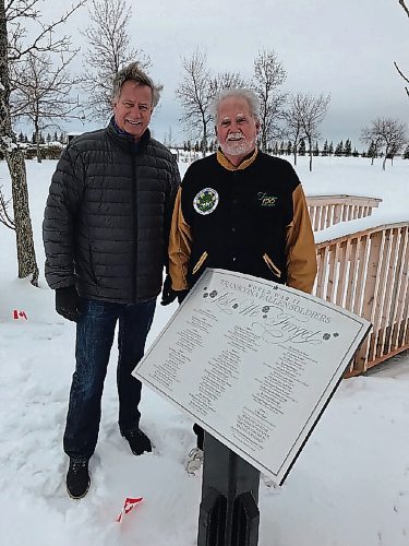 Canstar Community News Lawrence Toet and Peter Martin have spearheaded a project to install plaques honouring the 123 soldiers from Transcona who died and were buried in Europe during the First and Second World Wars. The plaques are now standing in Transcona Cemetery's Field of Honour. (SHELDON BIRNIE/CANSTAR/THE HERALD)