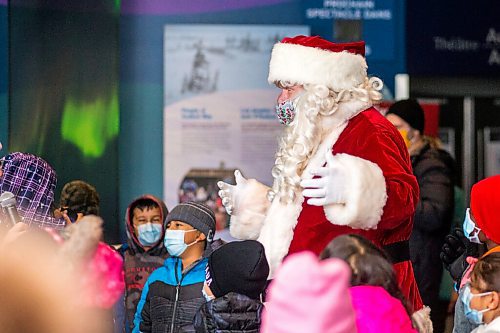 MIKAELA MACKENZIE / WINNIPEG FREE PRESS

Santa visits kids from Lavallee School at a Winter Wonderland party organized by Variety for kids from low-income schools at the Assiniboine Park Zoo in Winnipeg on Monday, Nov. 22, 2021. For Doug Speirs story.
Winnipeg Free Press 2021.