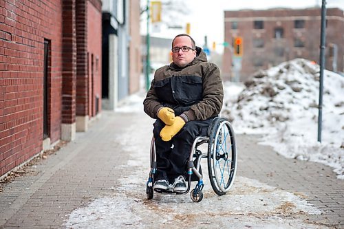 MIKAELA MACKENZIE / WINNIPEG FREE PRESS

Allen Mankewich, who faces challenges with sidewalk snow clearing every year as a wheelchair user, poses for a portrait downtown in Winnipeg on Monday, Nov. 22, 2021. For Joyanne story.
Winnipeg Free Press 2021.