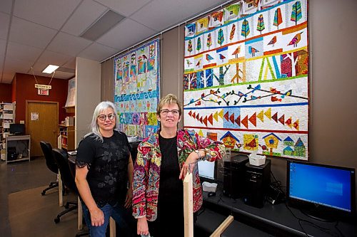 MIKE DEAL / WINNIPEG FREE PRESS
Jennifer P Wiebe (left) and Heather Stone (right) at the North Norfolk MacGregor Regional Library where five of the seven quilts are on display.
Seven ladies, all originally from MacGregror Manitoba have a quilting circle. During the pandemic they didn't gather under one roof but passed boxes of quilt pieces from one residence to the next. This resulted in seven quilts, five of which are on display at MacGregor Library. They have printed notecards which are on sale; money raised from these sales will be donated to a charity.
See Anucyia's story
211123 - Tuesday, November 23, 2021.
