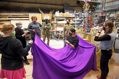 MIKE DEAL / WINNIPEG FREE PRESS
In the set department crew members get a first reveal of the Queens gown and standard which is still under construction.
(from left) Props Builder, Heather Lee Brereton, Costume Designer, Leanne Foley, Head of Props, Jamie Plummer, Props Builder, Jacko Garcia, Head of Wardrobe, Thora Lamont, Assistant Stage Manager, Ali Fulmyk, and Assistant Production Manager, Zahra Larche.
A behind-the-scene look at the Royal Manitoba Theatre Company's production of Orlando a play by Virginia Woolf and adapted by Sarah Ruhl, which is running from November 25 - December 18.
See Alan Small story
211102 - Tuesday, November 02, 2021.