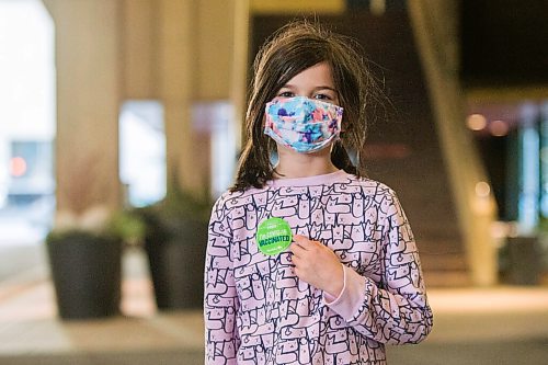 MIKAELA MACKENZIE / WINNIPEG FREE PRESS

Mary-Elle Clark (eight) poses for a portrait in front of the RBC Convention Centre vaccination supersite after getting vaccinated in Winnipeg on Wednesday, Nov. 24, 2021. For --- story.
Winnipeg Free Press 2021.