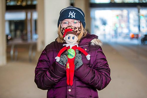 MIKAELA MACKENZIE / WINNIPEG FREE PRESS

Charlee Wolfe (nine) poses for a portrait with Elfy in front of the RBC Convention Centre vaccination supersite after getting vaccinated in Winnipeg on Wednesday, Nov. 24, 2021. For --- story.
Winnipeg Free Press 2021.