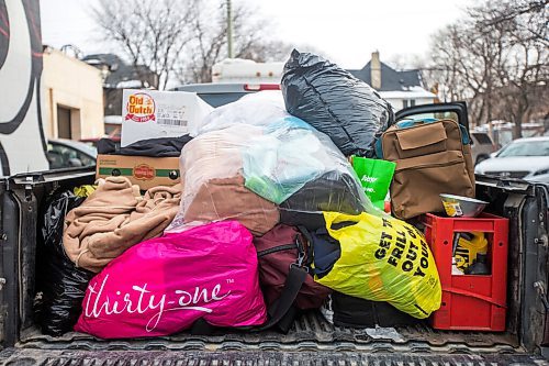 MIKAELA MACKENZIE / WINNIPEG FREE PRESS

A pickup truck full of winter gear donations (from a memorial held last weekend for Cassandra Sky Woodhouse-Braun-St. Clair) at RaY in Winnipeg on Friday, Nov. 26, 2021. For Kevin story.
Winnipeg Free Press 2021.