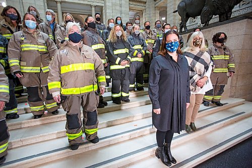 MIKE DEAL / WINNIPEG FREE PRESS
Premier Heather Stefanson is joined by a number of female firefighters on the grand staircase Friday afternoon, in the Manitoba Legislative building during the announcement that the government would be amending the Workers Compensation Act (WCA) to include coverage for five additional cancers to the list of presumptive cancers, pertaining to firefighters and at-risk personnel in the Manitoba Fire Commissioners Office.
211126 - Friday, November 26, 2021.