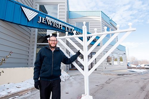 Mike Sudoma / Winnipeg Free Press
Rabbi Boruch Heidingsfeld shows off awooden menorah in front of the Chabad Jewish Learning Centre Wednesday afternoon. The menorah will be strapped into the back of a truck Sunday evening to use for the Chabad Jewish Learning Centres Mobile Menorah service, which runs from November 28 until December 6.
November 24, 2021