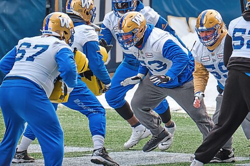 MIKE DEAL / WINNIPEG FREE PRESS
Winnipeg Blue Bombers Patrick Neufeld (53) and Michael Couture (59) during practice at IG Field Friday morning.
211126 - Friday, November 26, 2021.