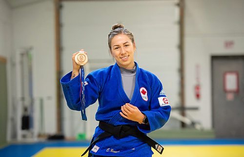 Mike Sudoma / Winnipeg Free Press
Olympic Bronze Medalist, Catherine Beauchemin-Pinard, shows off her Olympic Bronze medal she received at the Rocky 2020 Olympics prior to leading a training session at the Judo Manitoba Training Centre Friday evening
November 26, 2021