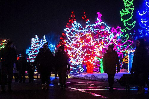 Mike Sudoma / Winnipeg Free Press
Zoo Lights attendees take in the light displays through out the Assiniboine Park Zoo Friday night 
November 26, 2021