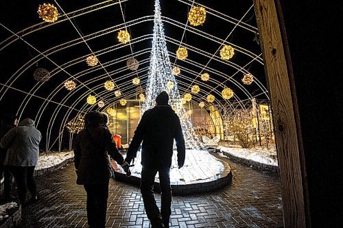 Mike Sudoma / Winnipeg Free Press
Zoo Lights attendees take in the light displays through out the Assiniboine Park Zoo Friday night 
November 26, 2021