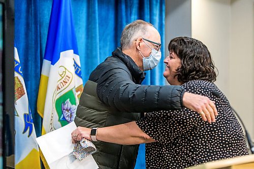 MIKAELA MACKENZIE / WINNIPEG FREE PRESS

Colleague Jennifer Holland hugs Bob Irving after he was surprised with a Community Service Award at City Hall in Winnipeg on Monday, Nov. 29, 2021. For Joyanne story.
Winnipeg Free Press 2021.