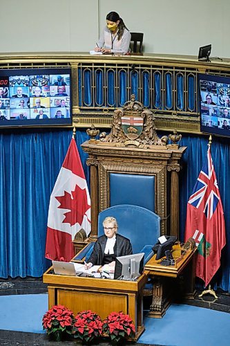 MIKE DEAL / WINNIPEG FREE PRESS
Winnipeg Free Press reporter Danielle Da Silva sits in the Press Gallery behind the Speaker of the Legislative Assembly of Manitoba, Myrna Driedger, as she delivers the first-ever instance of a land acknowledgement as part of the formal proceedings of the legislative assembly of Manitoba Monday afternoon.
211129 - Monday, November 29, 2021.