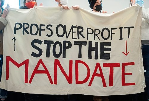 Mike Sudoma / Winnipeg Free Press
Student representatives hold up a sign reading Profs Over Profit. Stop The Mandate while voicing concerns over educational finances and the current University of Manitoba Strike in the midst of Finance Minister, Scott Fieldings 2022 Budget Consultation at the RBC Convention Centre Monday evening.
November 29, 2021