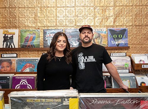 JESSICA LEE / WINNIPEG FREE PRESS

Co-owners and husband and wife Brent Jackson and Loriana Costanzo of Urban Waves/Old Gold Vintage Vinyl, located in Osborne Village, are photographed in the store on December 1, 2021.

Reporter: Dave











