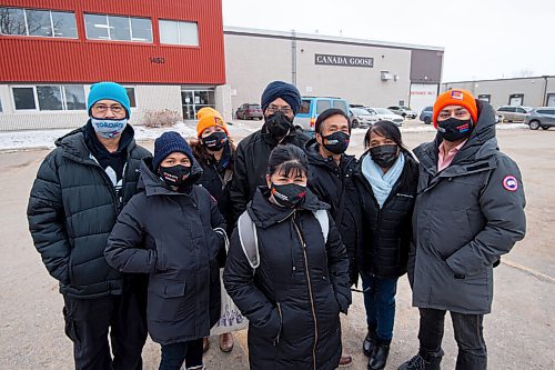 Mike Sudoma / Winnipeg Free Press
Union organizers (left to right) Allan Mendoza, Mary Jane Quierre, Mildred Caldo, Manmohan Sidhu, Yolanda Obermaier, Andres Garcia, Rabin Syed, Aseem Saraswat, celebrate outside of Canada Goose Thursday afternoon after a successful union certification vote
December 2, 2021